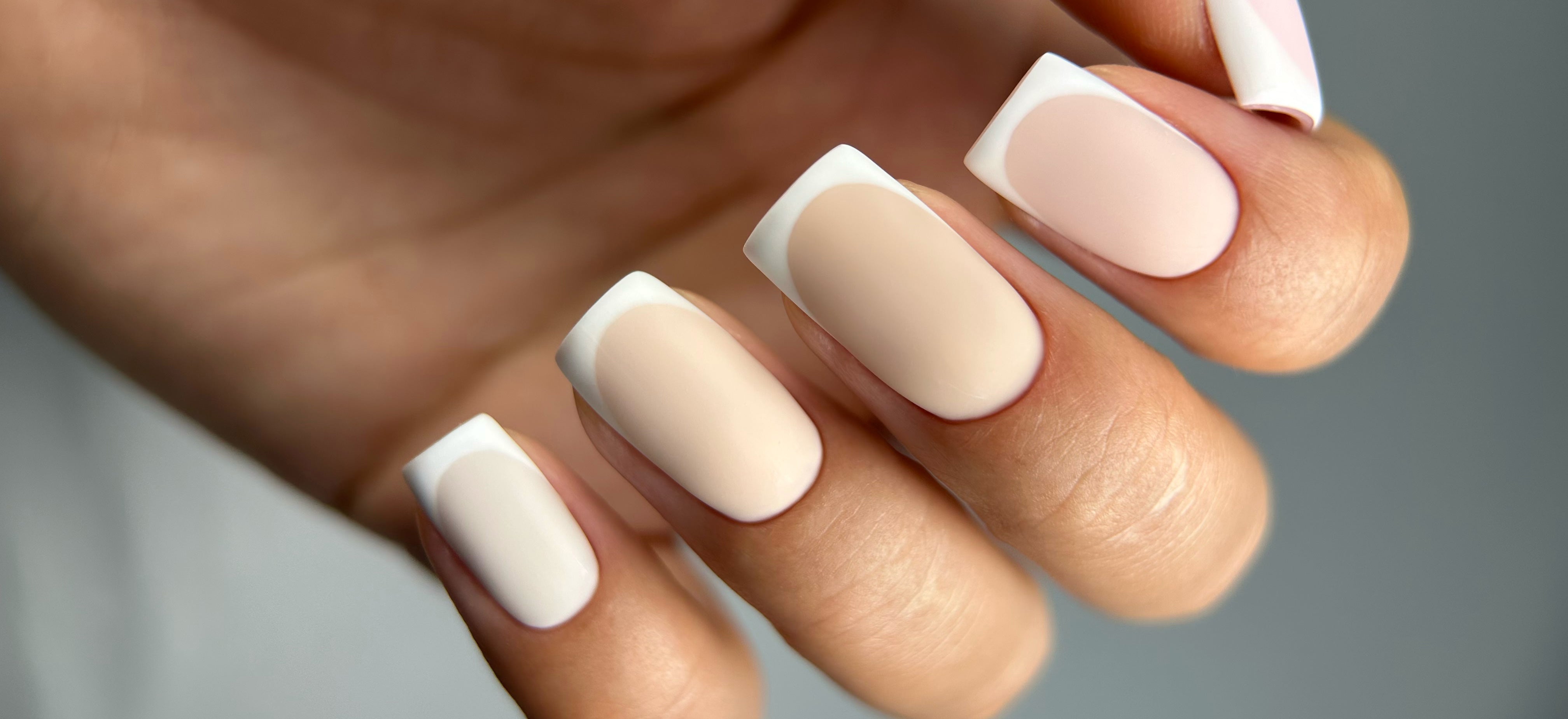 Close-up of a classic matte French manicure using shades from Paloma's Nude Collection. The soft, natural tones provide an elegant base for the French tips, perfect for a refined and timeless look. Each shade is highly-pigmented and long-lasting, ideal for a sophisticated nude or French manicure