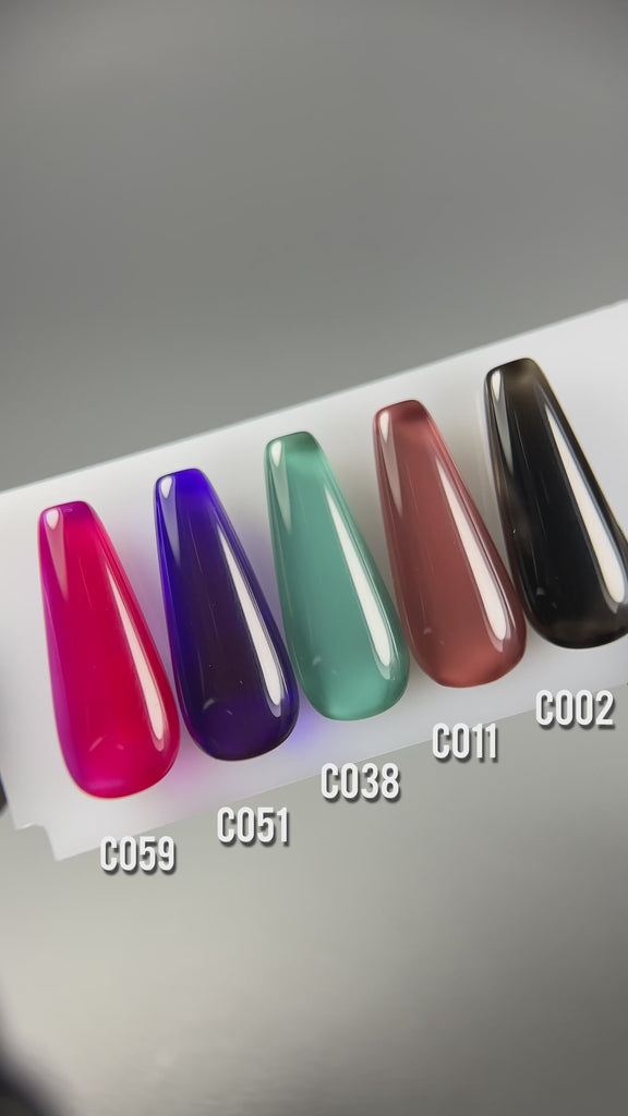 Video showcasing the Paloma Mystery Forest gel polish collection set, featuring five rich colors: burgundy, green, chocolate brown, black, and deep purple. This special offer includes all five long-lasting, highly-pigmented gel polishes for the price of four. Finished with Paloma Shine Top Coat, these colors are perfect for creating bold, glossy, and sophisticated gel manicures.